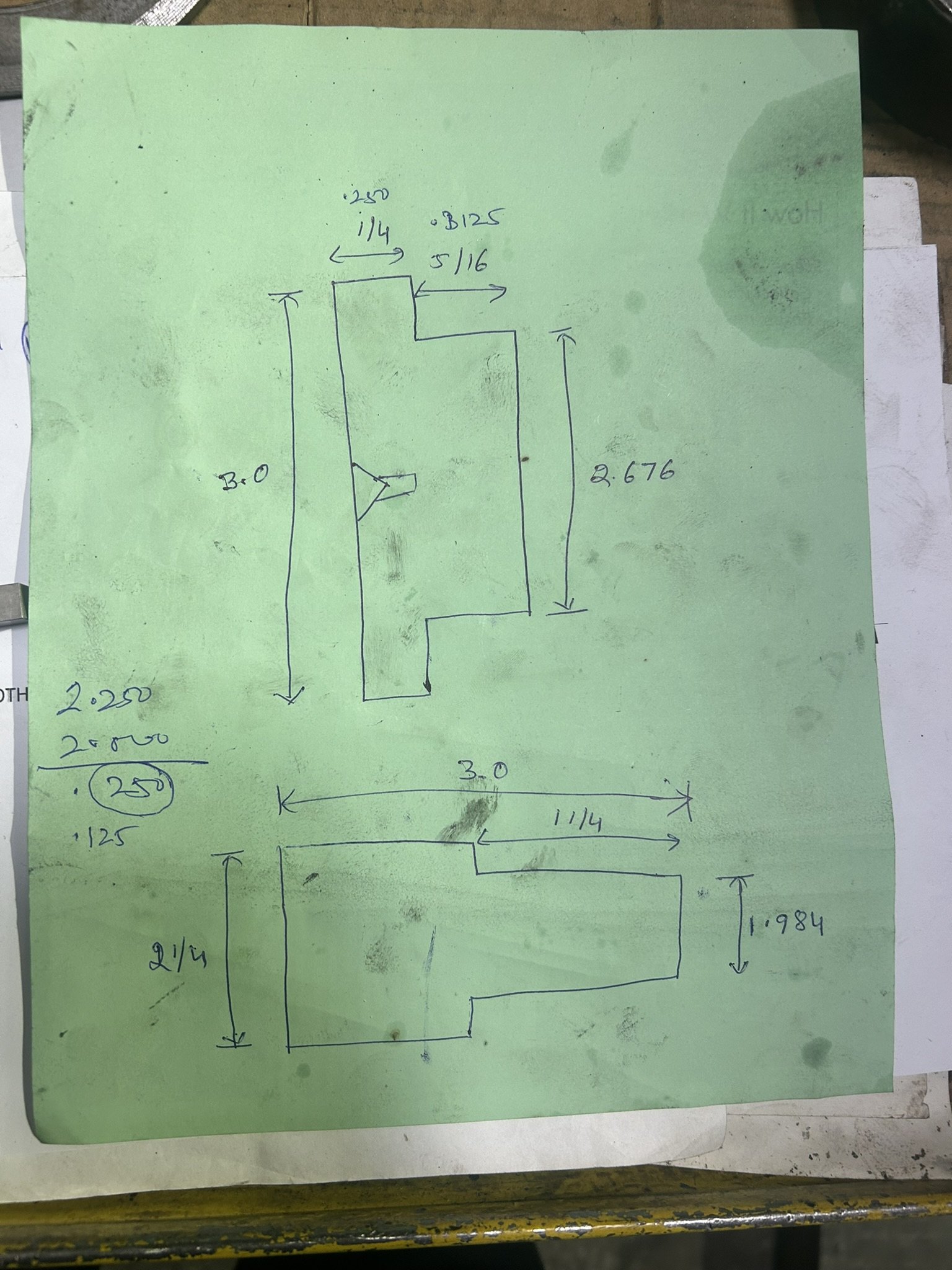 Working the cut on paper. Depth of cut taken from the diameter difference, taped to the machine